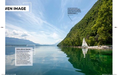 Belle vue du lac du Bourget avec un voilier accosté sur la rive