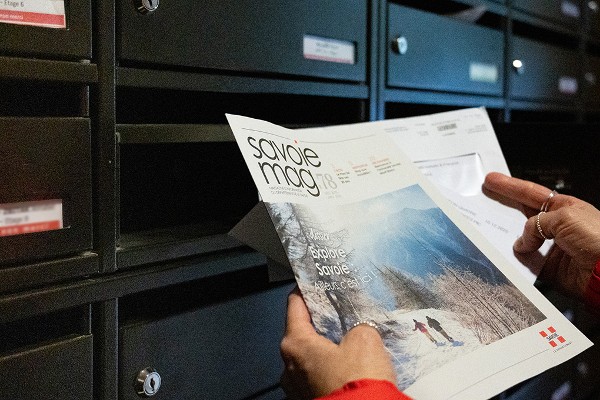 Un Savoie mag dans des mains